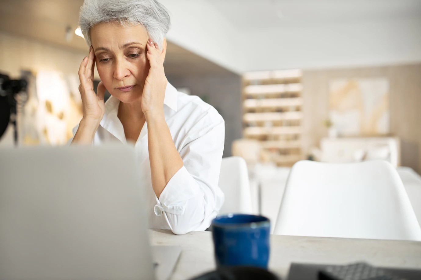 lady getting frustrated with internet security on her laptop