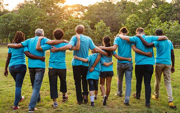 group of people wearing blue for random act of kindness day