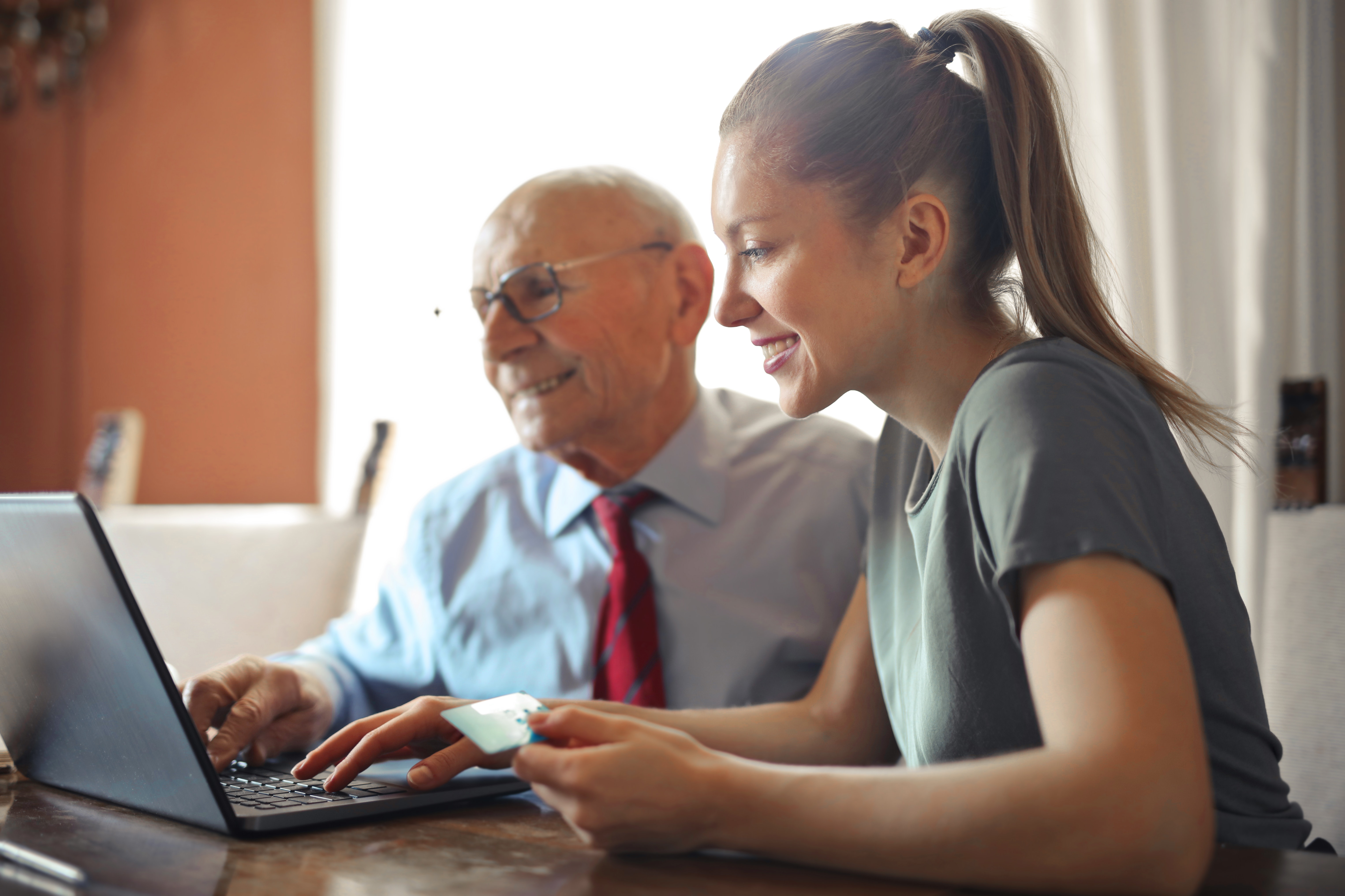 finding stairlifts for seniors on laptop - acorn stairlifts nz