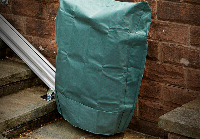 outdoor stairlift with weatherproof cover on
